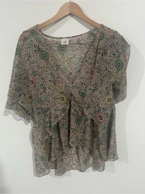 CAbi V-Neck Short Sleeve Peplum Blouse in Multi Green, Pink, Yellow